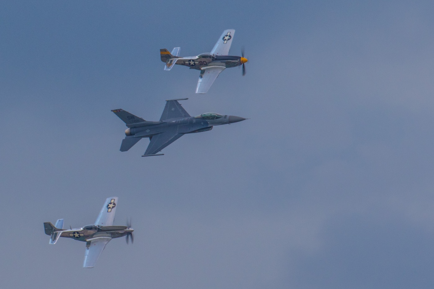 11 P-51's and F-16 formation.jpg